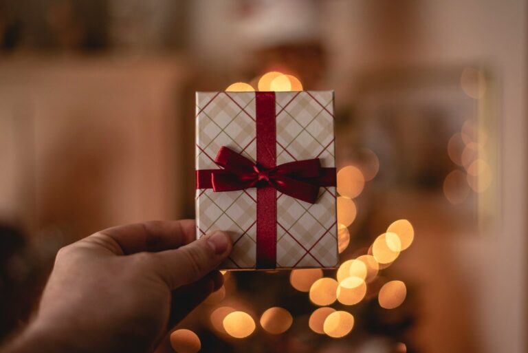 Jan 15 - National Use Your Gift Card Day: Making the Most of Your Gift Cards in the Rio Grande Valley person holding white gift card